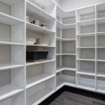 White pantry with lots of shelving. PNW Closets designs and installs custom pantry storage in Portland OR and Vancouver WA.