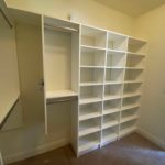 Walk-in closet with multiple storage shelves