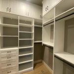Custom design walk-in closet shelves, cabinets and closed drawers