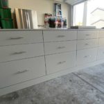 large grey garage storage drawers in garage, drawers closed