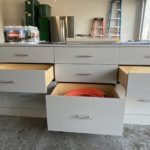 Large grey garage storage drawers in garage