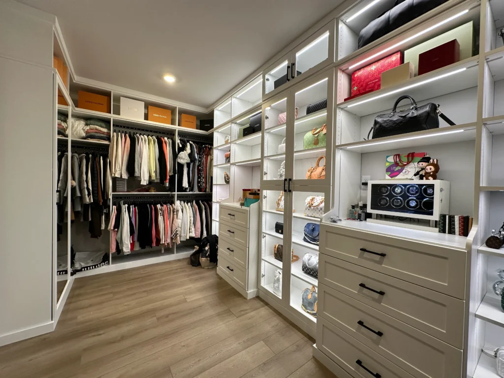 Custom walk-in closet system with shelving and hanging space built by PNW Closets in Portland OR