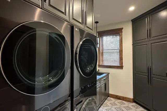 Luxury laundry room by PNW Closets